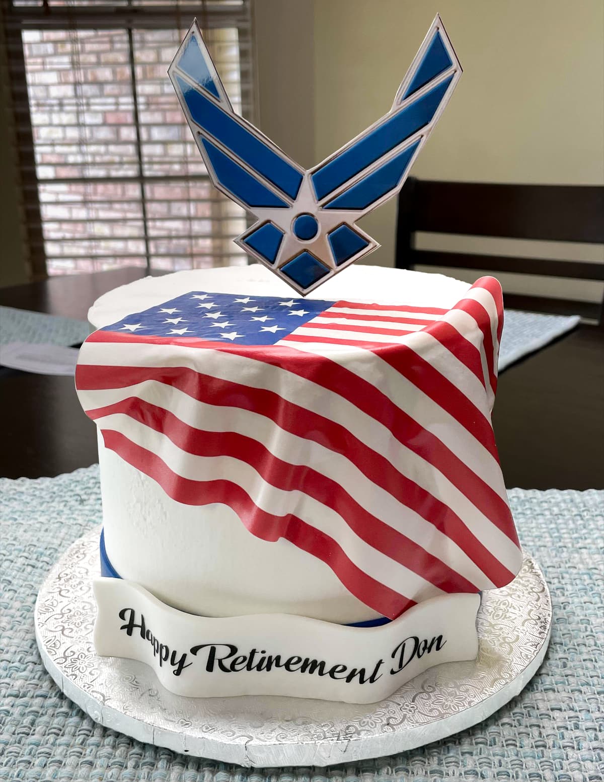 Air Force retirement cake with American flag design and Air Force emblem by Sweet Cakes by Kristen