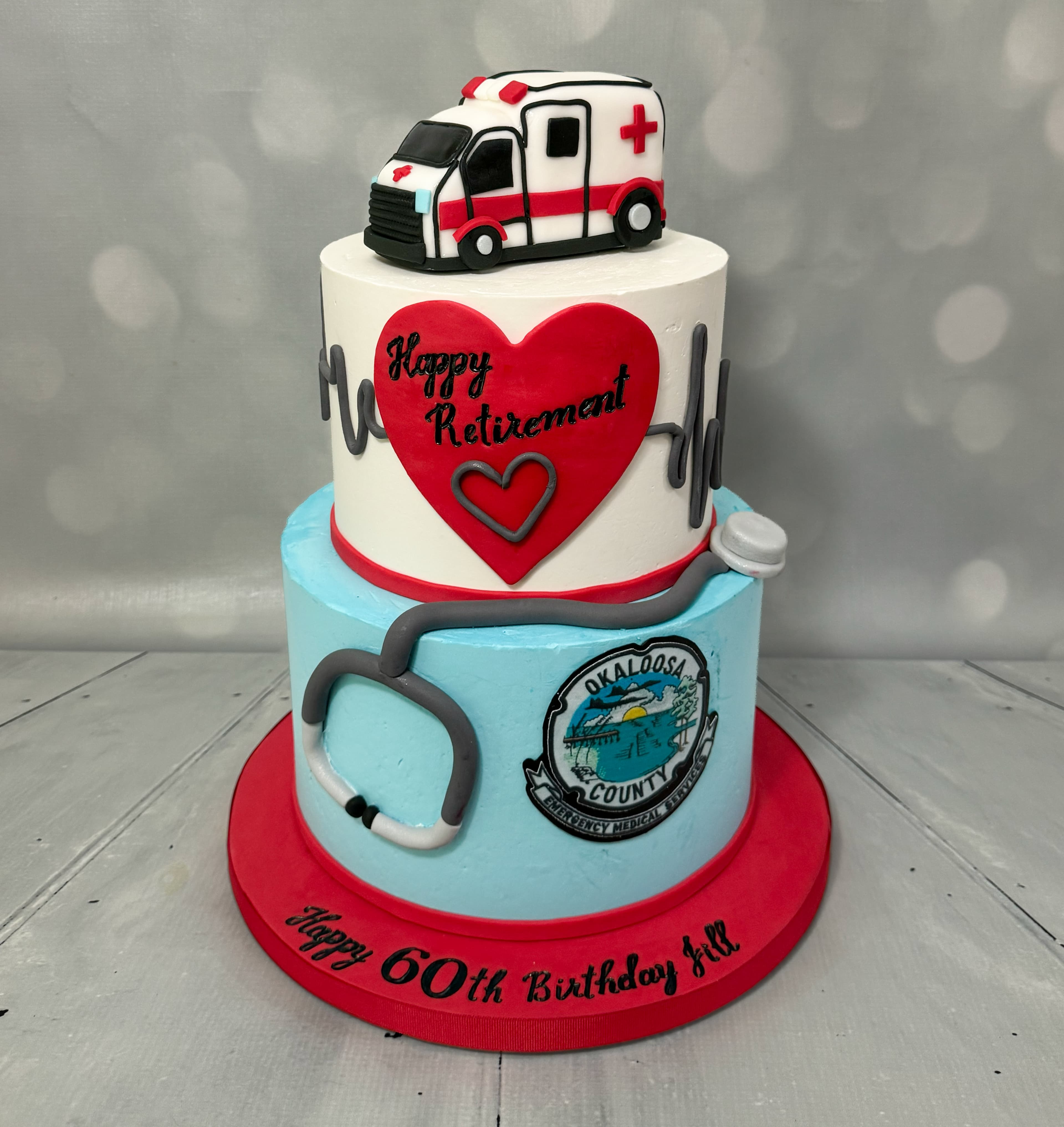 First responder retirement cake with sculpted ambulance and medical details by Sweet Cakes by Kristen
