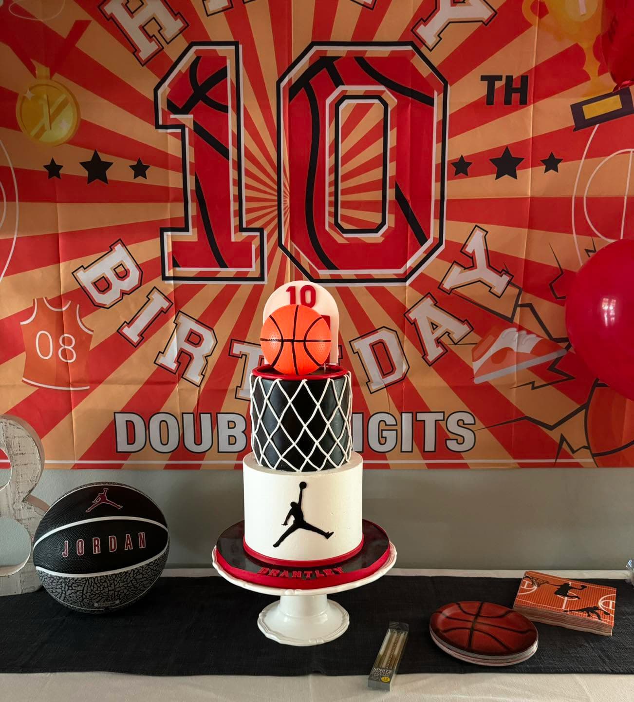 Basketball themed 10th birthday cake with basketball hoop and sports decorations by Sweet Cakes by Kristen