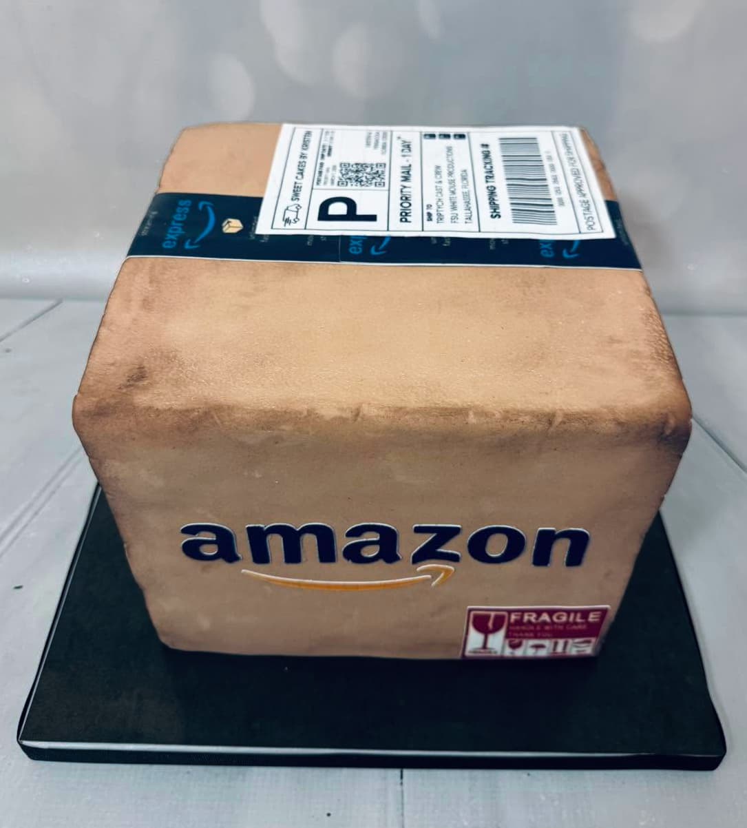 Realistic sculpted Amazon shipping box cake by Sweet Cakes by Kristen